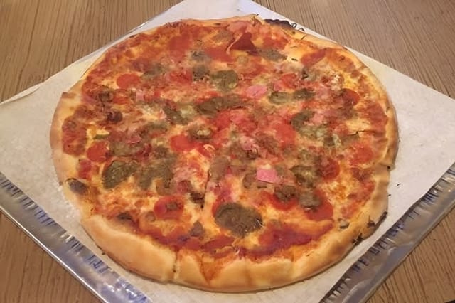 Meat Lover's Pizza Slice.